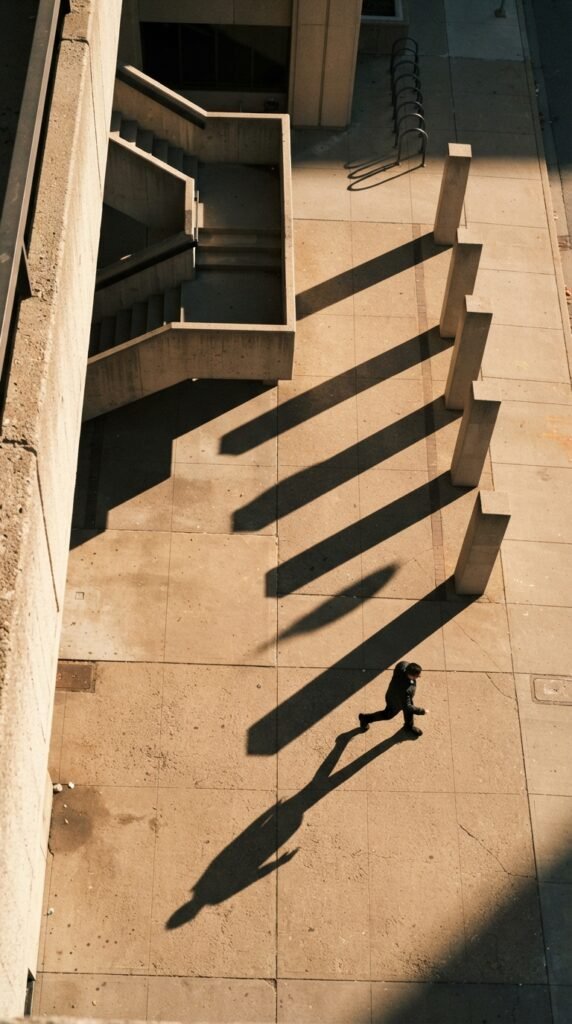 oil-1 Person walking across shadows